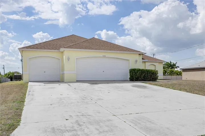 3rd garage and 3-car width drive provides plenty of storage and parking options
