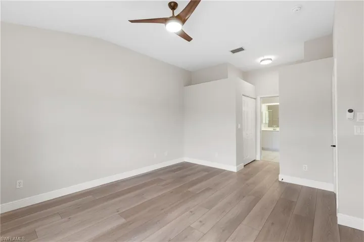 View of closet and Primary Bathroom entrance
