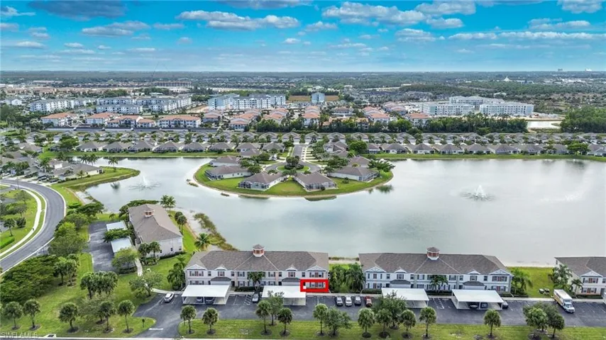 Aerial view of residential area with a large body of water