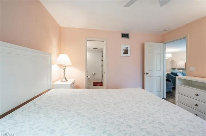 Bedroom featuring ceiling fan and hardwood / wood-style floors