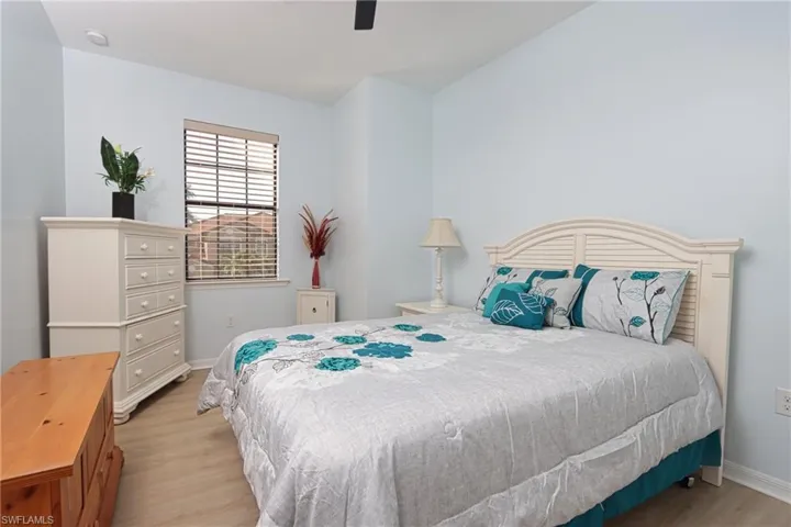 Bedroom with light hardwood / wood-style floors