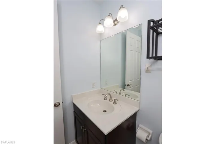 Bathroom with vanity and toilet