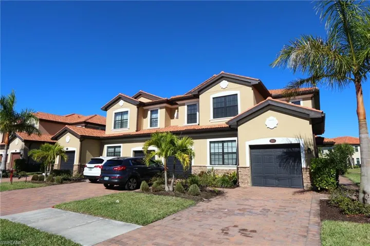 View of front of home featuring a garage
