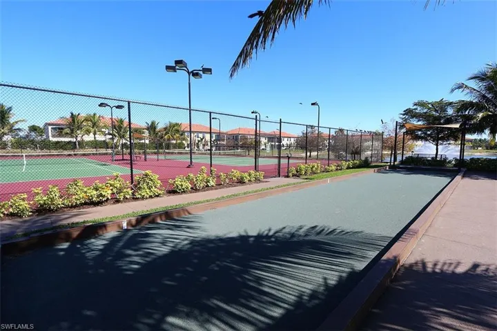 View of property's community with tennis court
