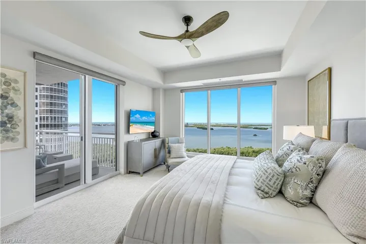 With private lanai access, this bedroom creates a tranquil indoor-outdoor retreat.