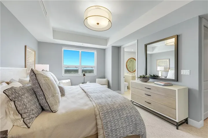 Situated away from the primary suite on the opposite side of the home, this bedroom provides a secluded and private retreat.