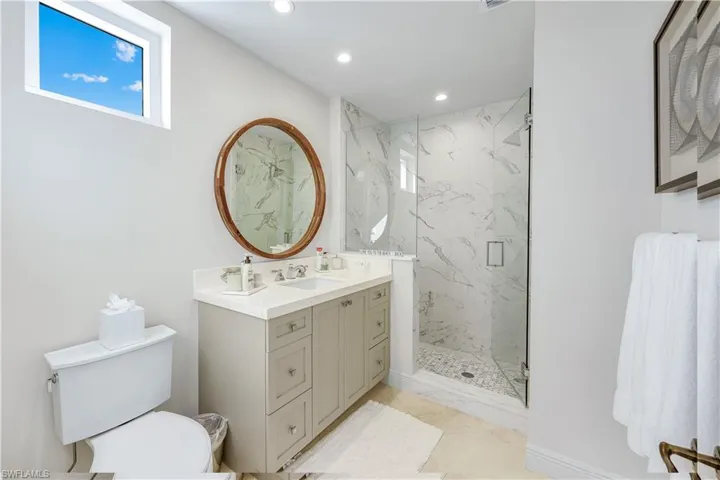 Guest bathroom with a large walk-in shower.