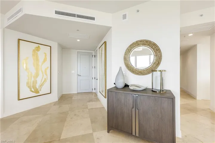A light-filled entryway welcomes you into this elegant residence.