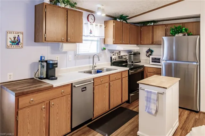 Kitchen has a dishwasher and island!