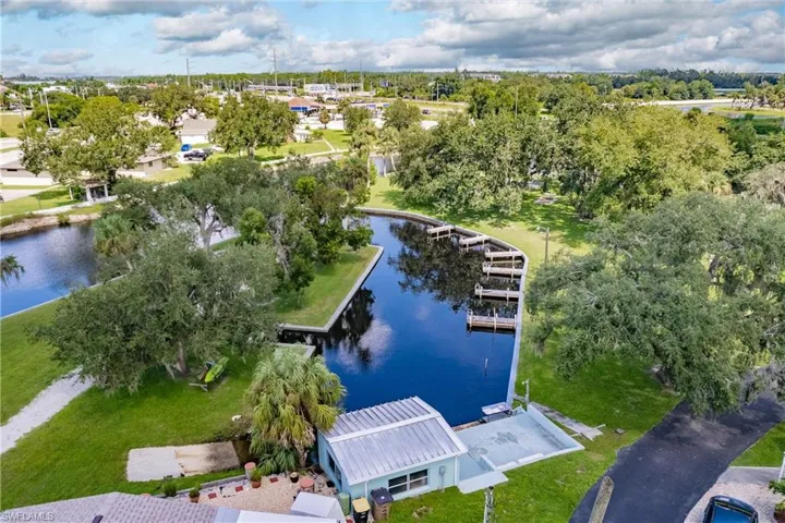Drone / aerial view of community clubhouse and marina