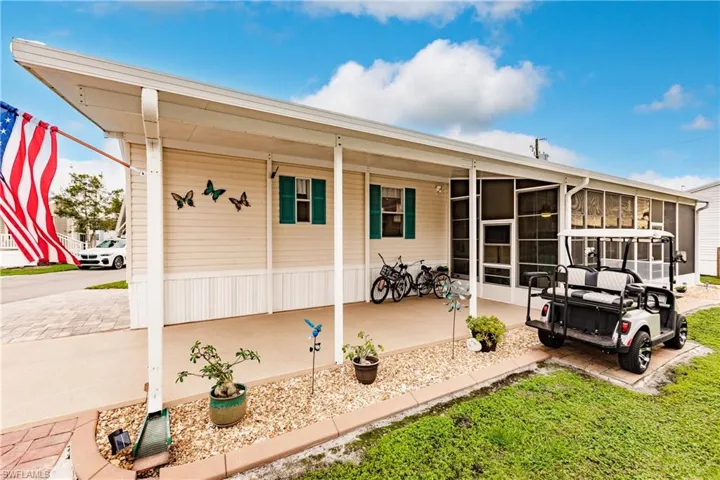 Impeccably Maintained home - 2 car carport and screened an dair conditioned lanai