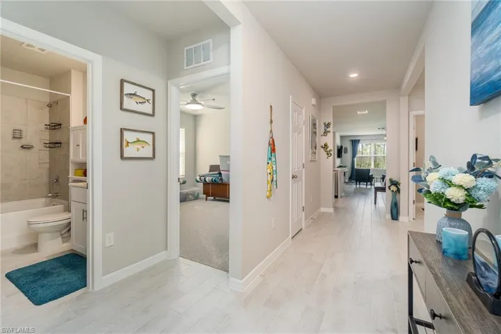 Foyer featuring light plank tile flooring