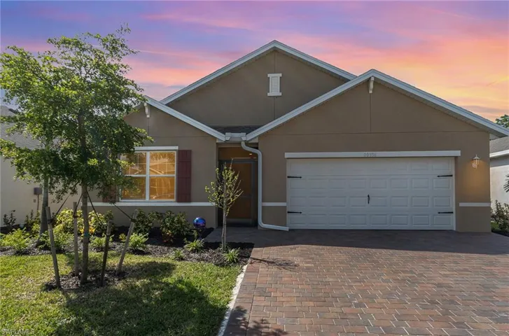 View of front of property featuring a garage
