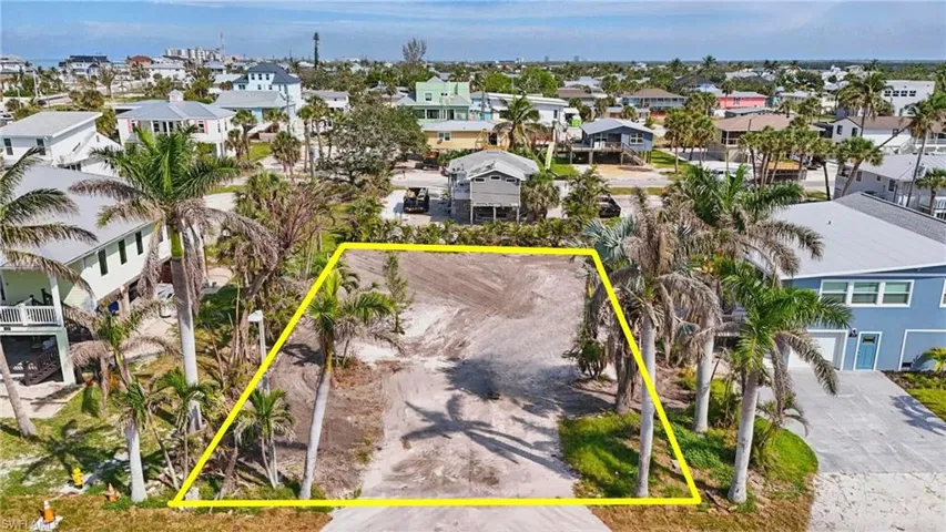 Aerial view of residential area with property boundaries