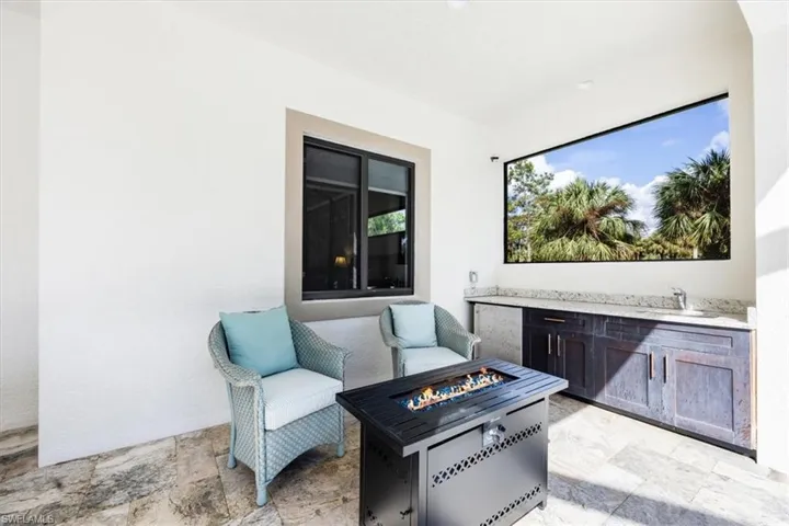 View of patio / terrace with sink, refrigerator and cabinets