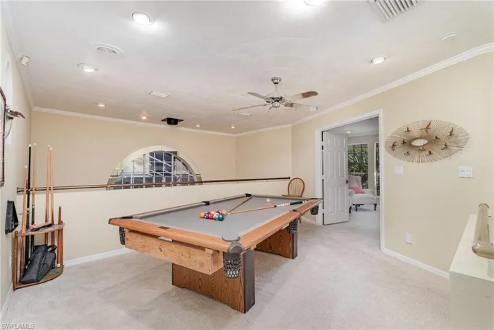 Game room with carpet floors, billiards, ornamental molding, ceiling fan, and recessed lighting