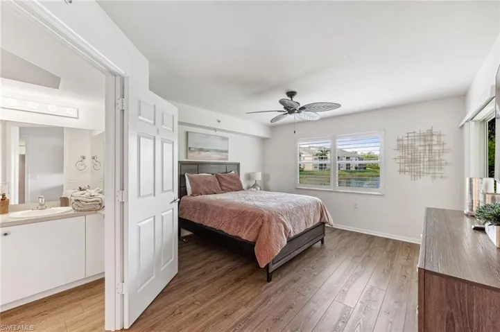 Bedroom featuring light wood-style floors and ceiling fan
