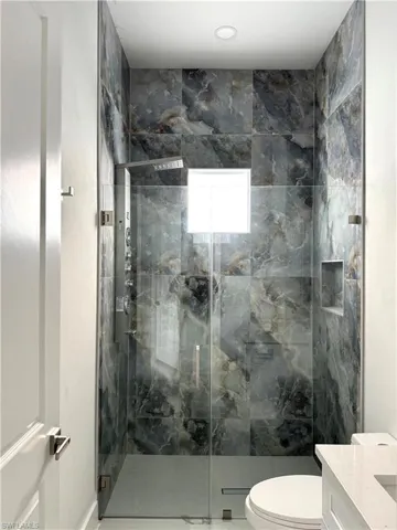 Guest bathroom with massage shower tower