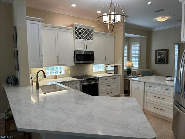 New kitchen with quartz and stainless appliances