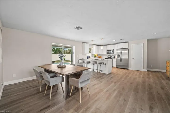 Dining space featuring light hardwood / wood-style floors