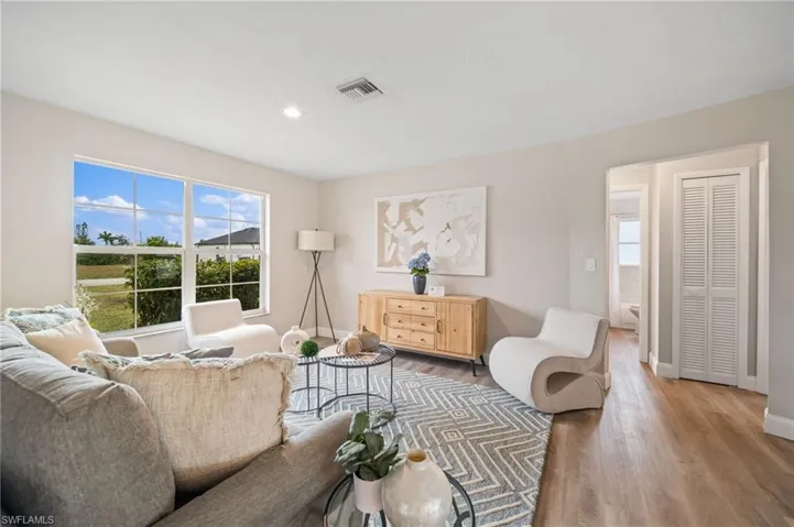 Living room featuring hardwood / wood-style floors