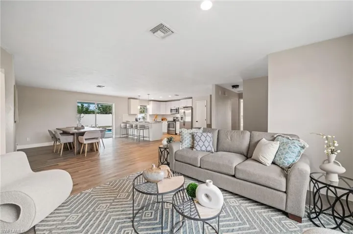Living room featuring hardwood / wood-style flooring