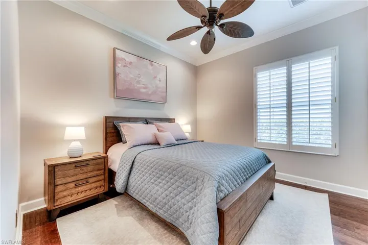 Bedroom #2.  All bedrooms have new wood flooring and plantation shutters