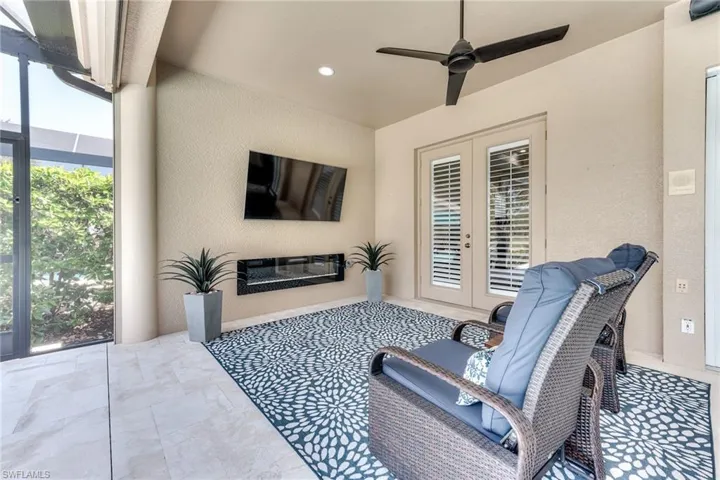 TV area off the primary bedroom also has an electric fireplace for color and heat.