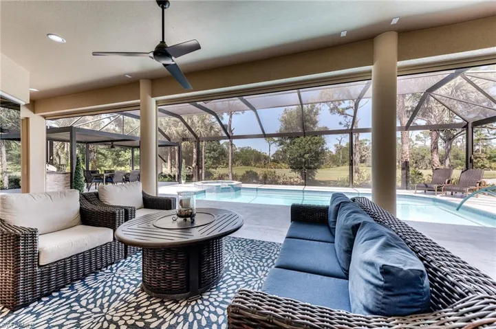 Dining pergola and outdoor kitchen to the left