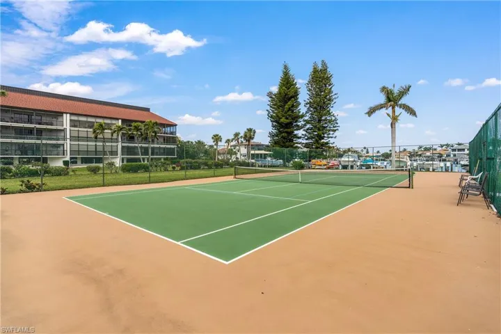 View of sport court with basketball hoop