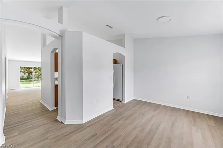 Spare room featuring light hardwood / wood-style floors