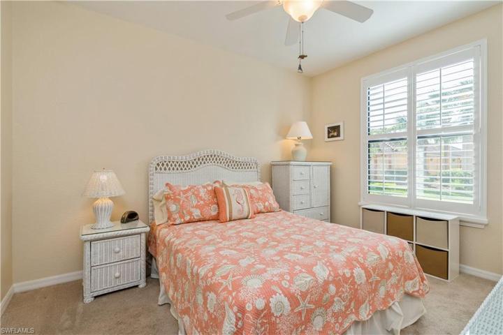 Guest bedroom with plantation shutters