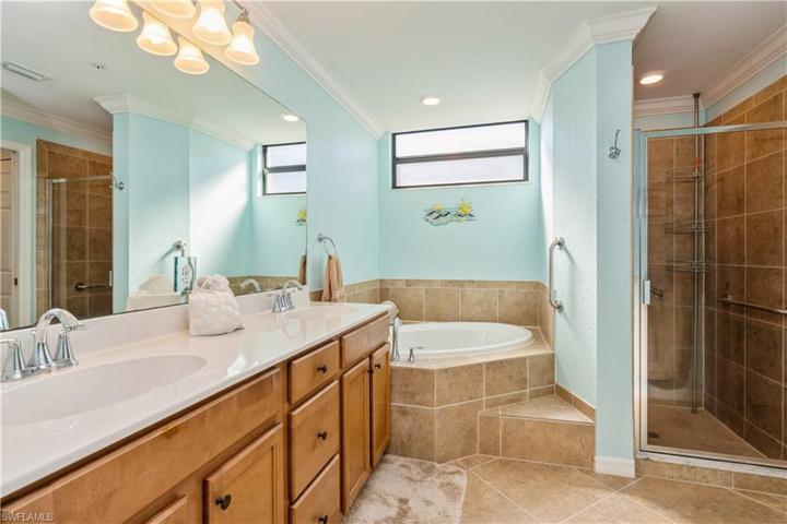 Owners' bath with soaker tub, double vanities, separate shower
