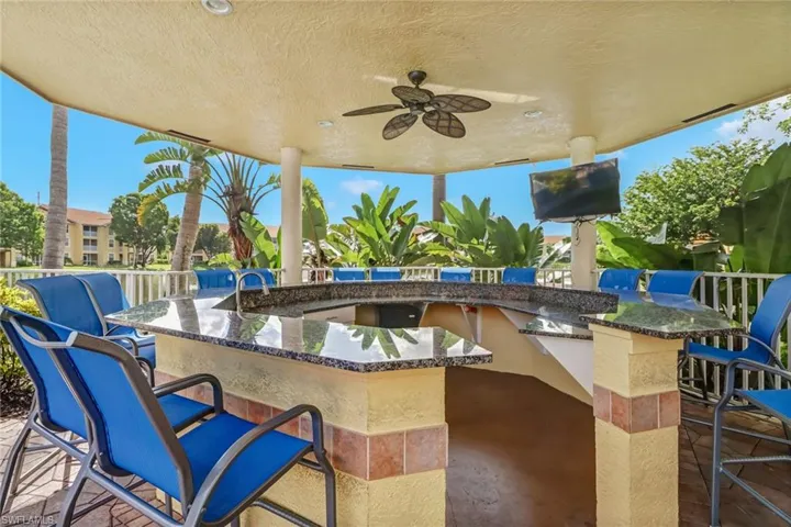 View of patio with a ceiling fan