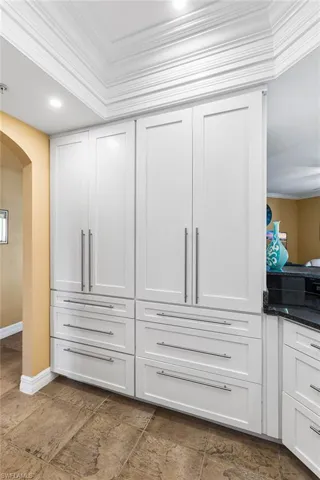 Ample custom white cabinets