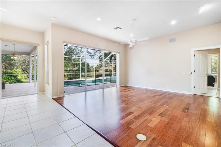 Great room with Mahogany flooring and ceiling fan