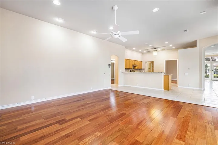Great room with Mahogany flooring and open to kitchen
