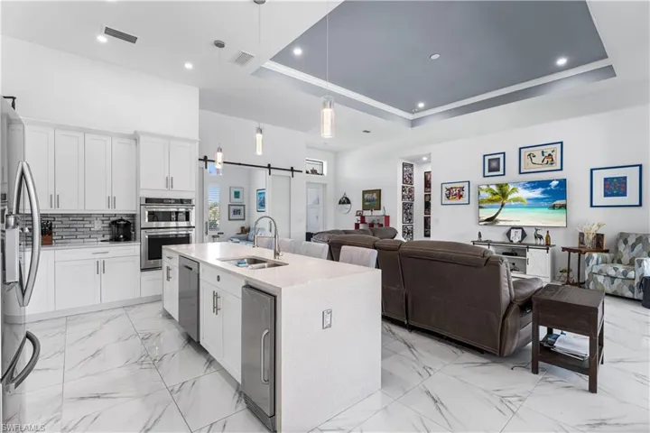 Open-concept kitchen and living area.