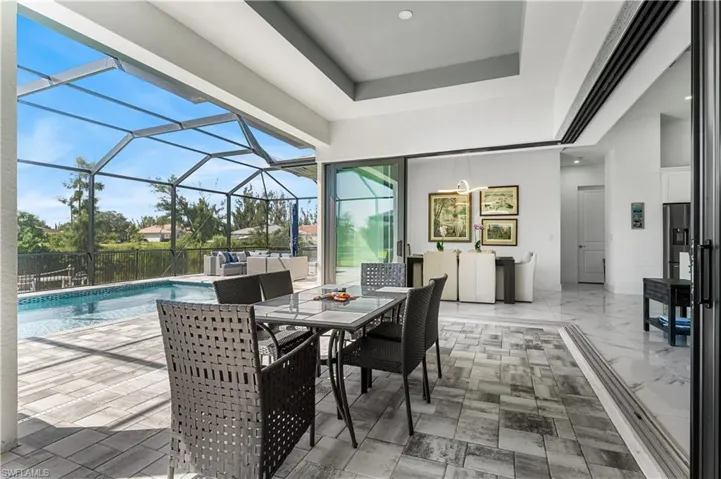 Expansive lanai area, featuring plenty of room for dining.