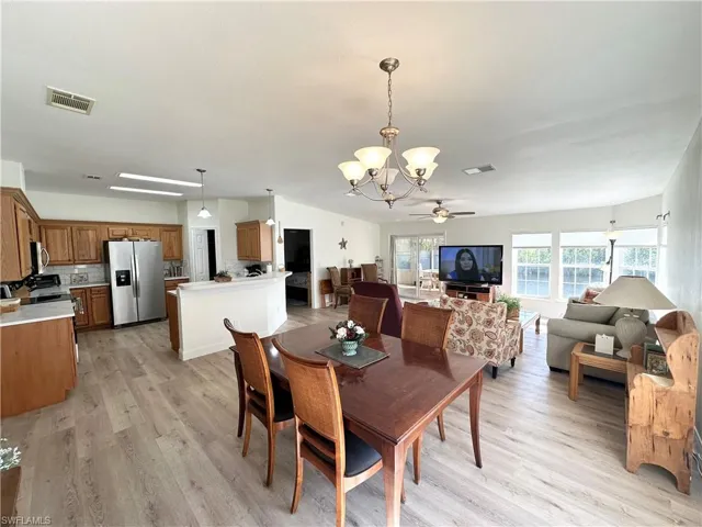 looking at dinning across to kitchen and living