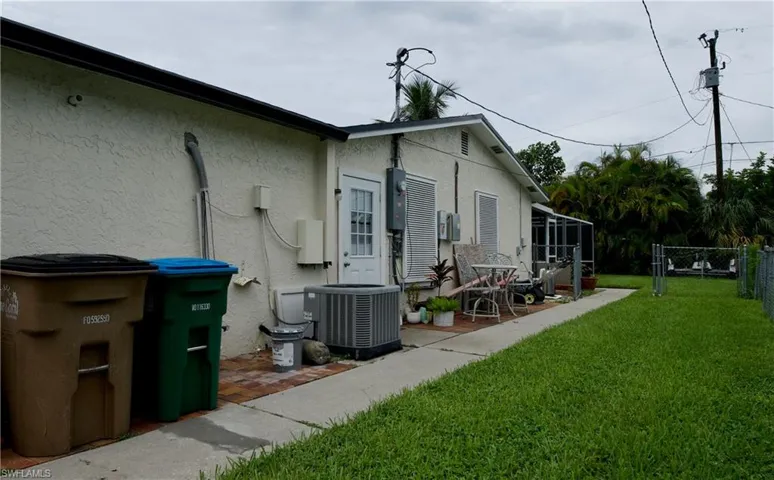 Back of property featuring stucco siding and a patio area