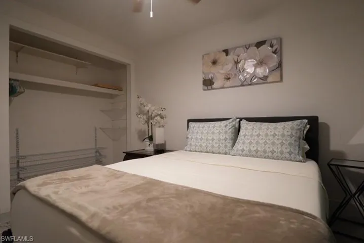 Bedroom featuring a ceiling fan