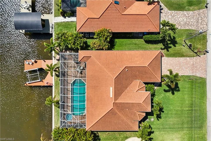Aerial view of a large body of water and a pool