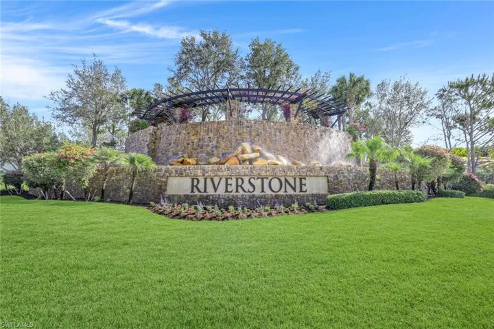 Community sign featuring a lawn