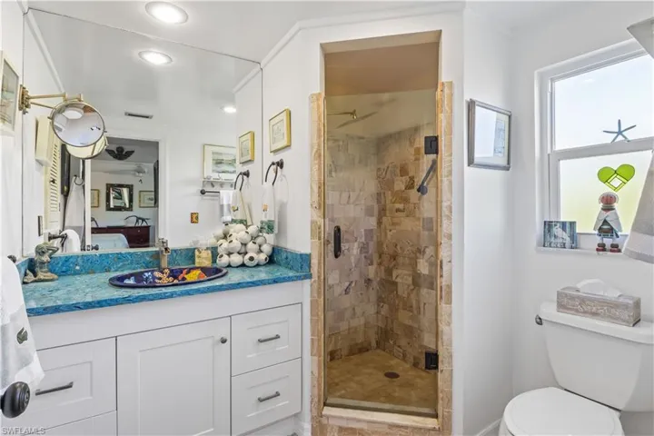 Bright and elegant master bath with walk-in shower and premium finishes.