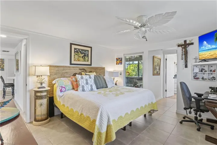 Bright and spacious master suite with direct views of the water, offering the ultimate comfort and tranquility.
