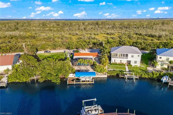 Located directly across from the Calusa Land Trust preserve, enjoy uninterrupted nature views and complete privacy.