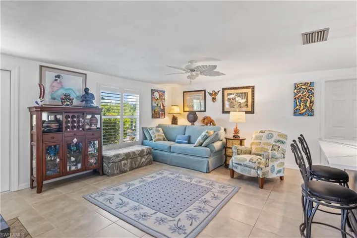 Open-concept living space bathed in natural light, perfect for relaxing or entertaining.
