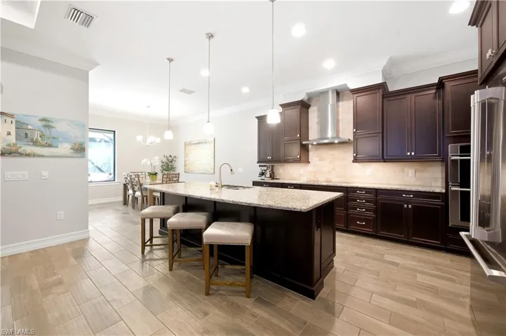 Open concept kitchen ideal for family gatherings