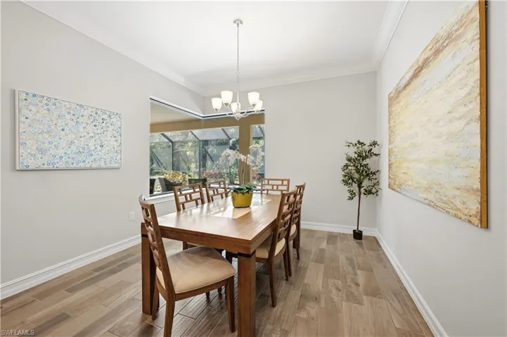 Magnificent Dinning Area with natural Light and Window to the pool deck